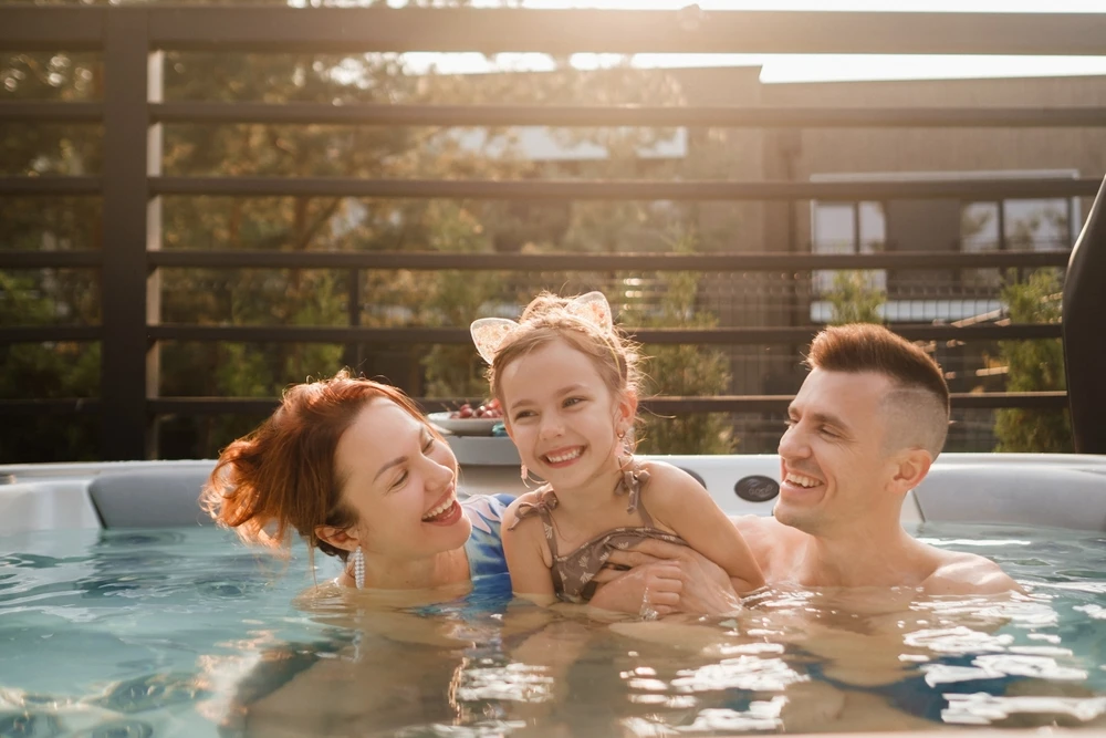 family in a hot tub at a cabin in Sevierville TN